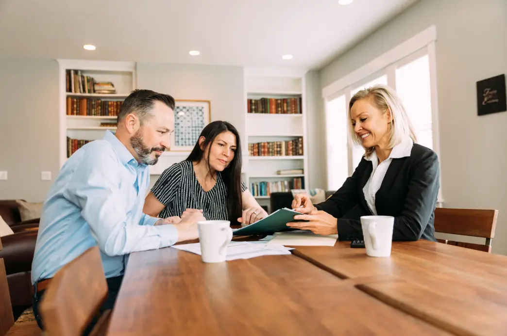 Financial Advisor Guiding a Couple Through Their Options