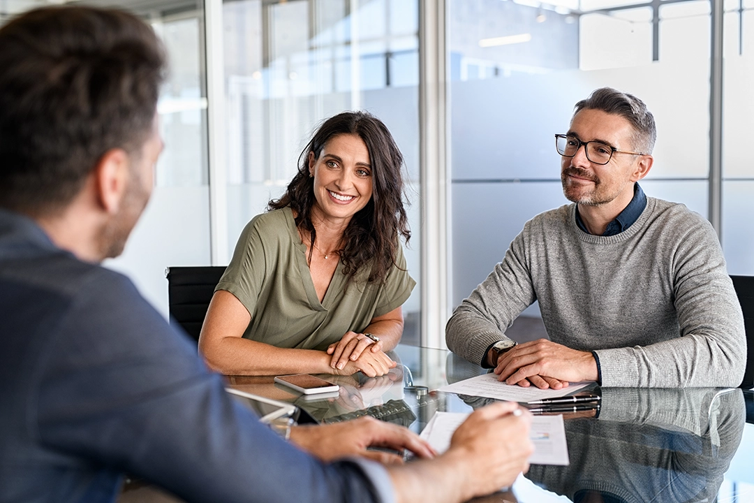 Smiling family with estate attorney